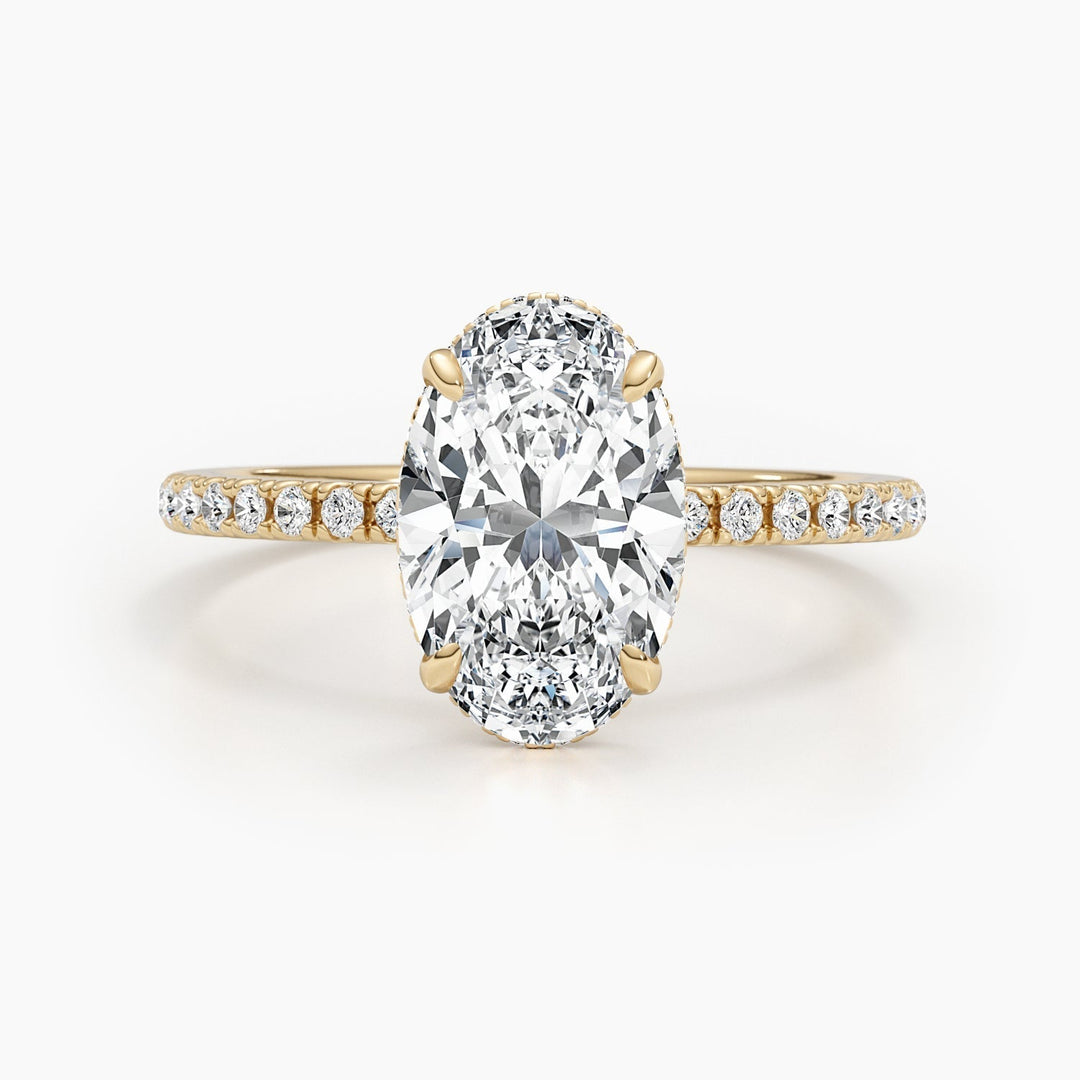 Oval cut pave engagement ring shown in real-life wear