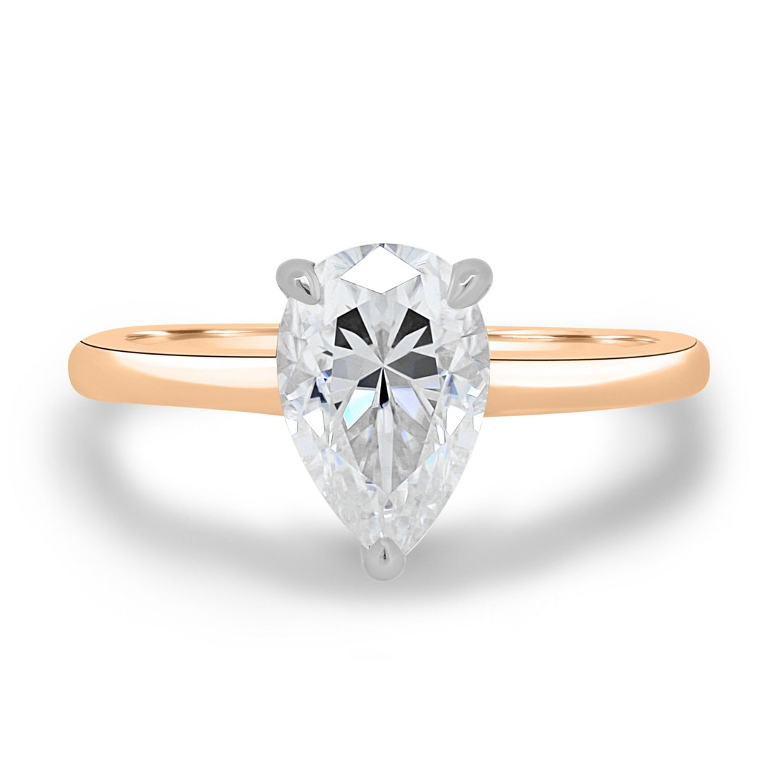 Side angle of pear solitaire diamond engagement ring