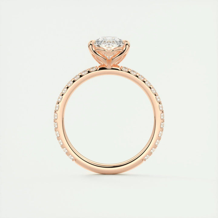 Detailed close-up of pear pave diamond engagement ring