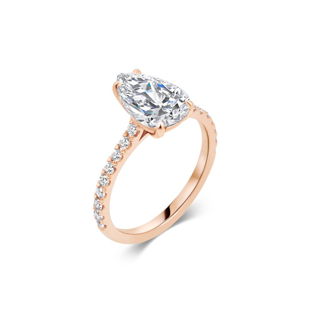 Pear pave engagement ring with brilliant diamond sparkle