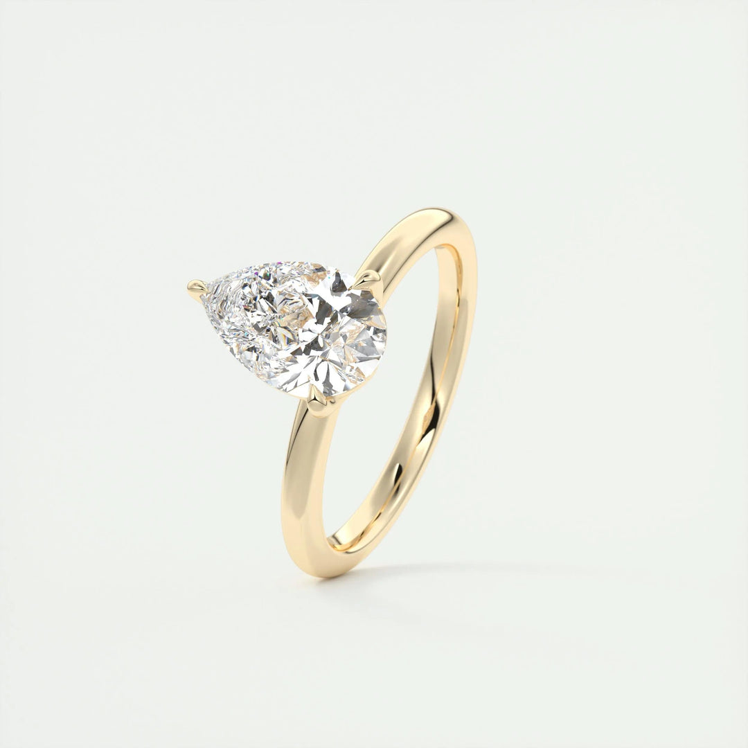 Handcrafted pear cut solitaire lab grown diamond engagement ring