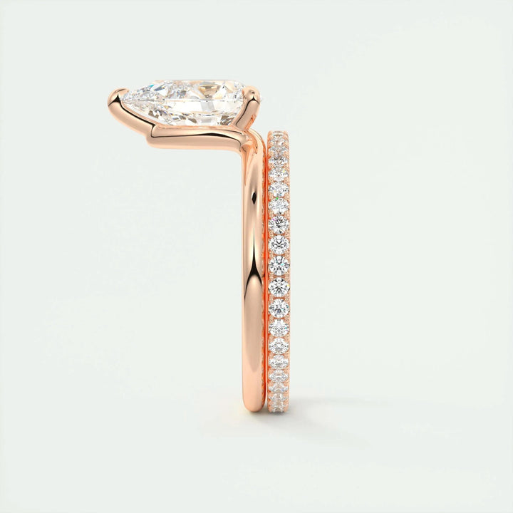 Pear cut diamond ring worn on hand