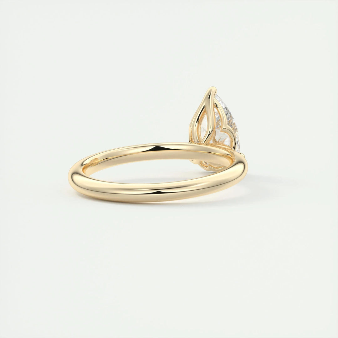 Classic pear solitaire engagement ring crafted for everyday wear