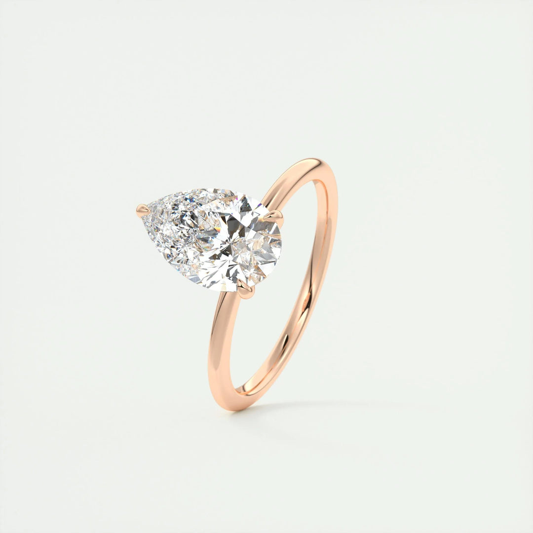 Pear cut solitaire engagement ring with IGI certified center diamond