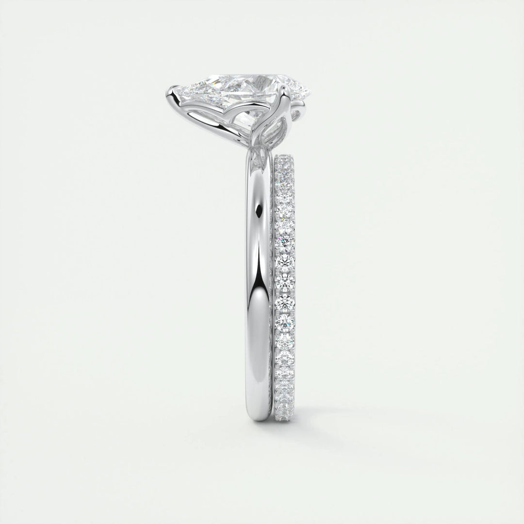 Close-up of pear cut center diamond in solitaire engagement ring