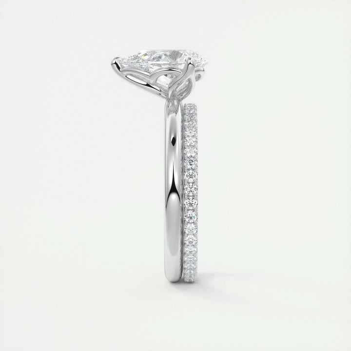 Close-up of pear cut center diamond in solitaire engagement ring