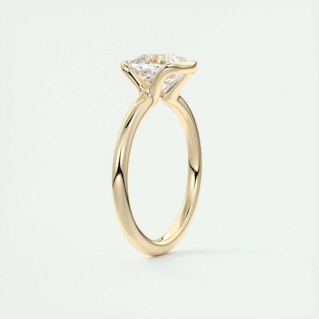 Cushion solitaire engagement ring close-up highlighting diamond sparkle