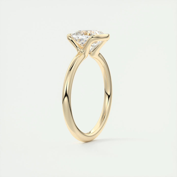 Cushion solitaire engagement ring close-up highlighting diamond sparkle