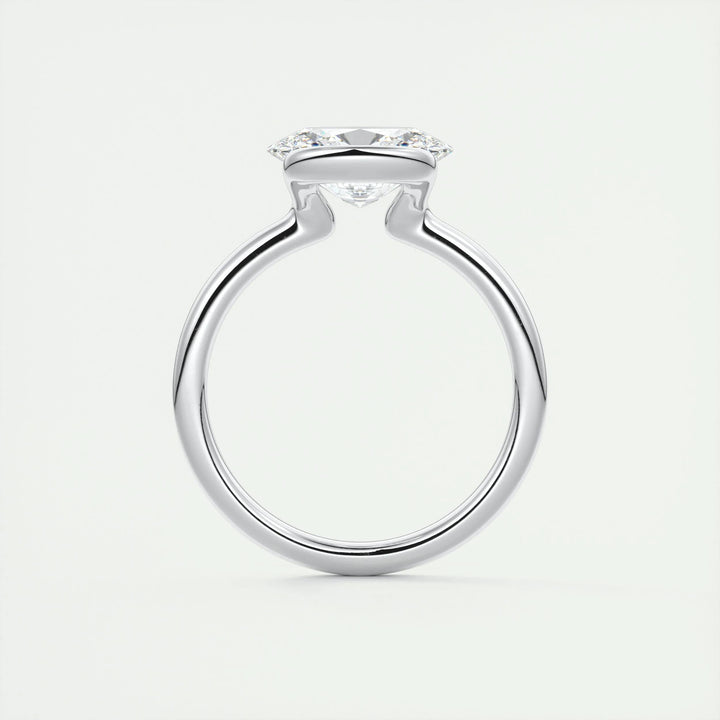 Oval bezel diamond engagement ring available in multiple metals