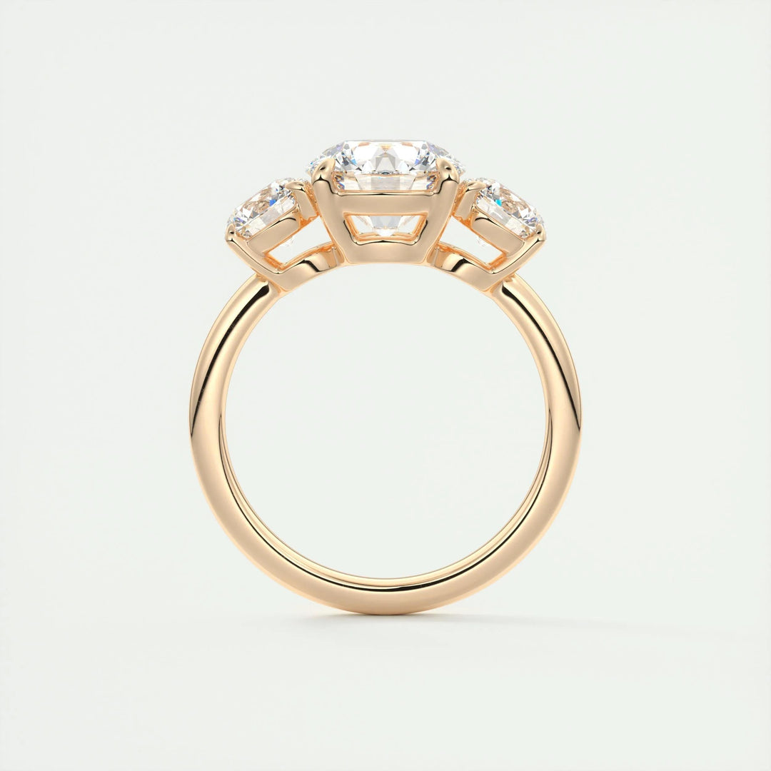 Round three stone lab grown diamond ring side profile in gold setting