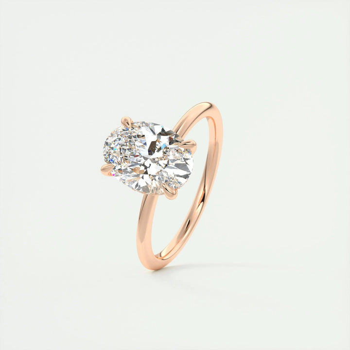 Fine craftsmanship detail on oval hidden halo engagement ring