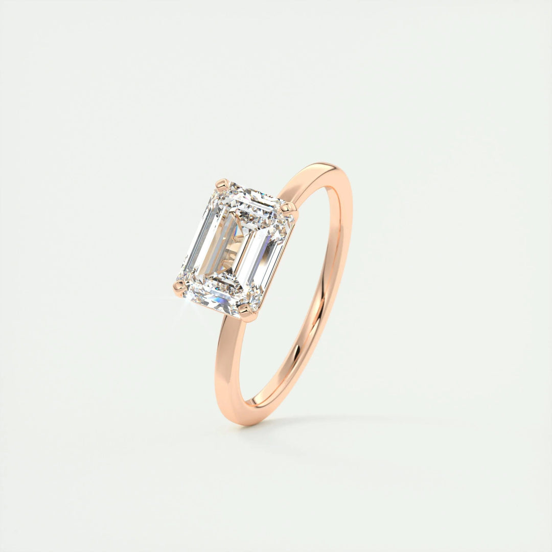 Emerald east west engagement ring with IGI certificate and packaging