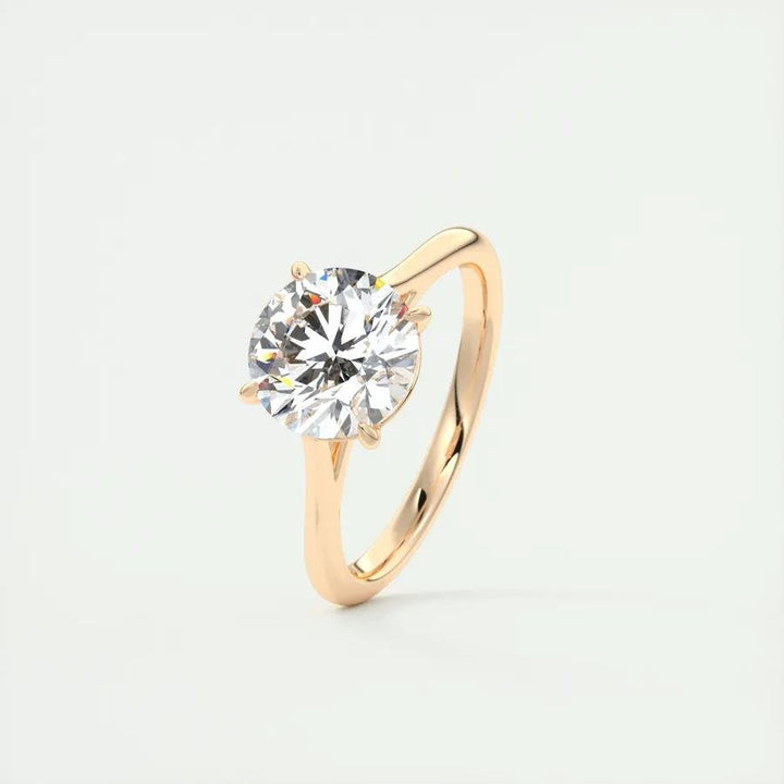 Detailed close-up of round solitaire diamond engagement ring