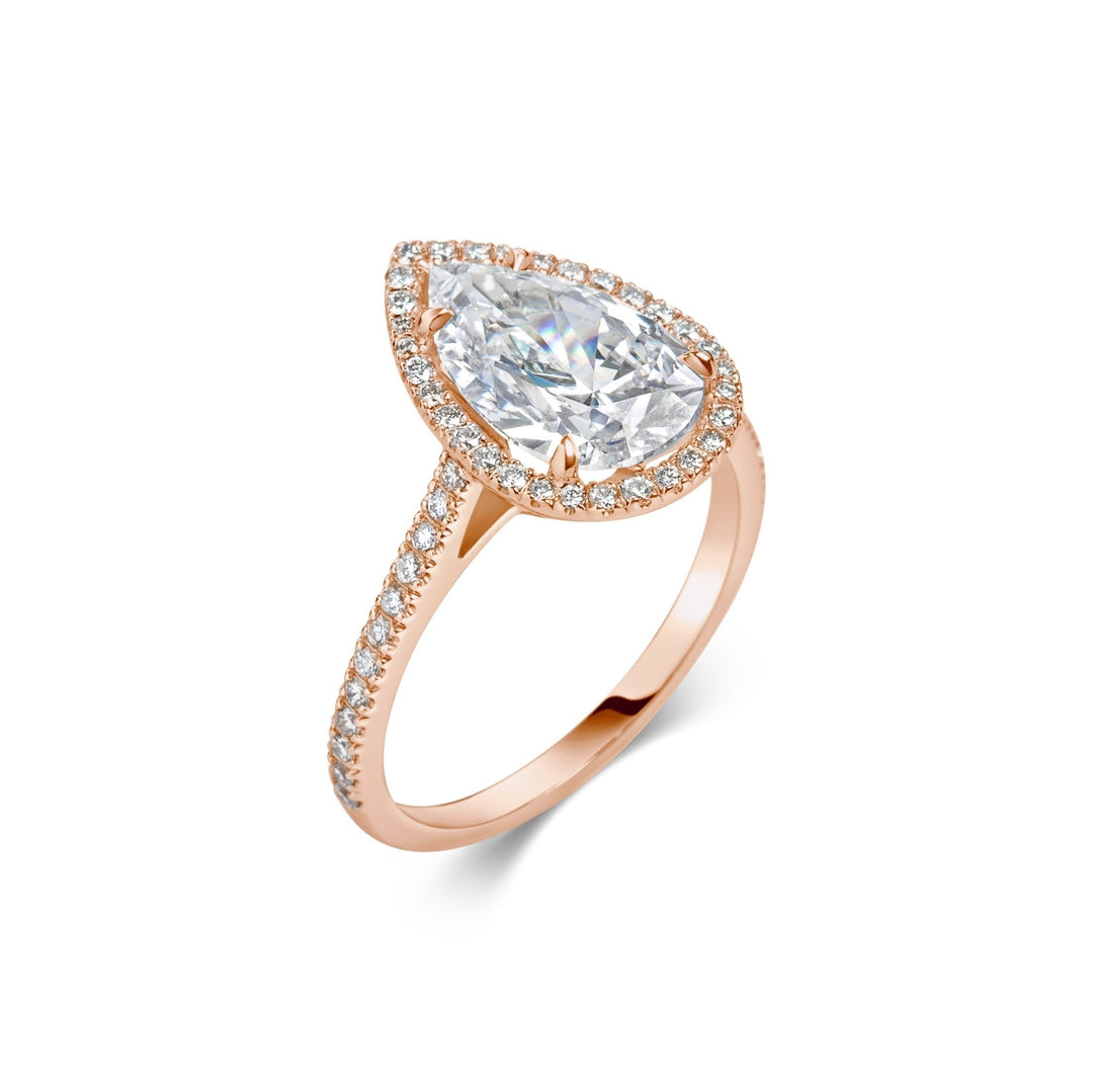 Pear cut diamond ring worn on hand