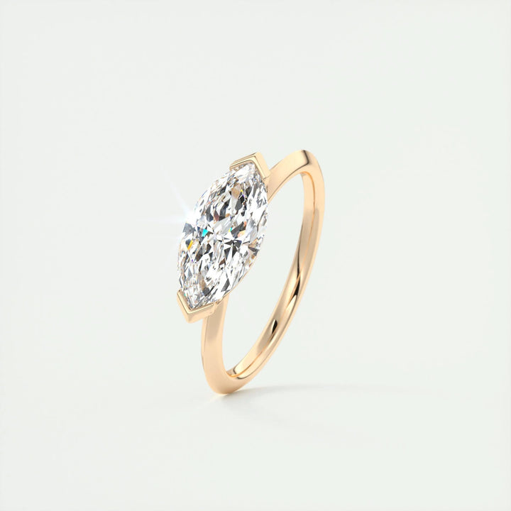Marquise solitaire lab grown diamond ring side profile in gold setting