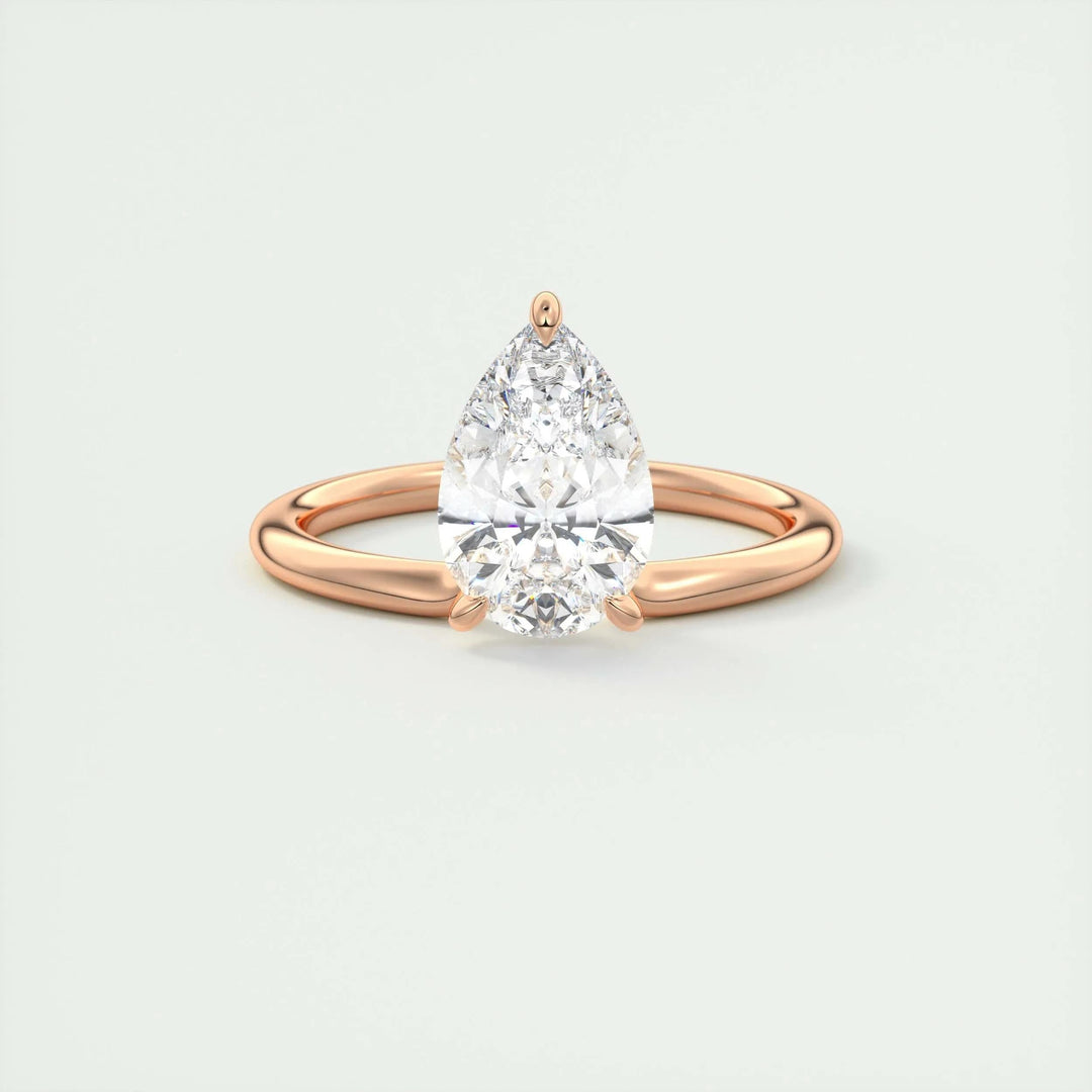 Side angle of pear solitaire diamond engagement ring
