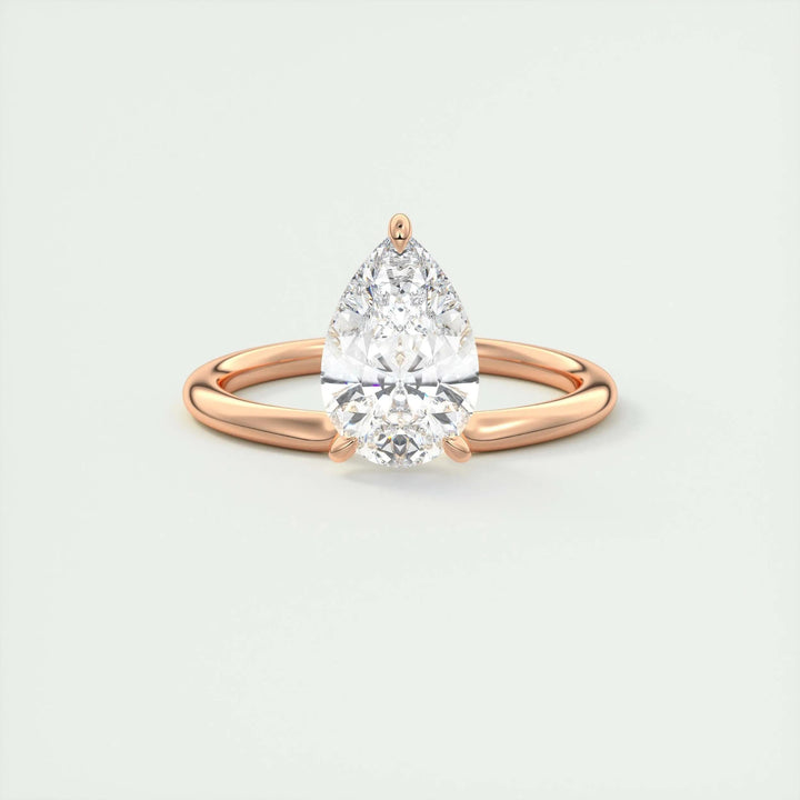 Side angle of pear solitaire diamond engagement ring
