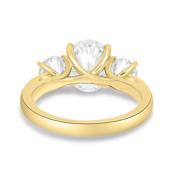 Oval three stone engagement ring viewed from the side