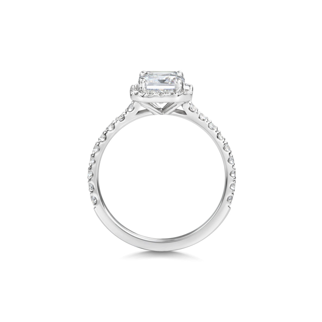 Emerald cut diamond ring worn on hand