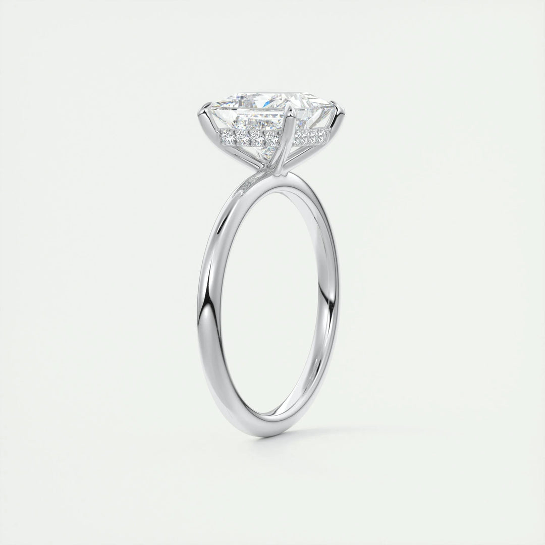 Lifestyle shot of princess hidden halo diamond ring on hand