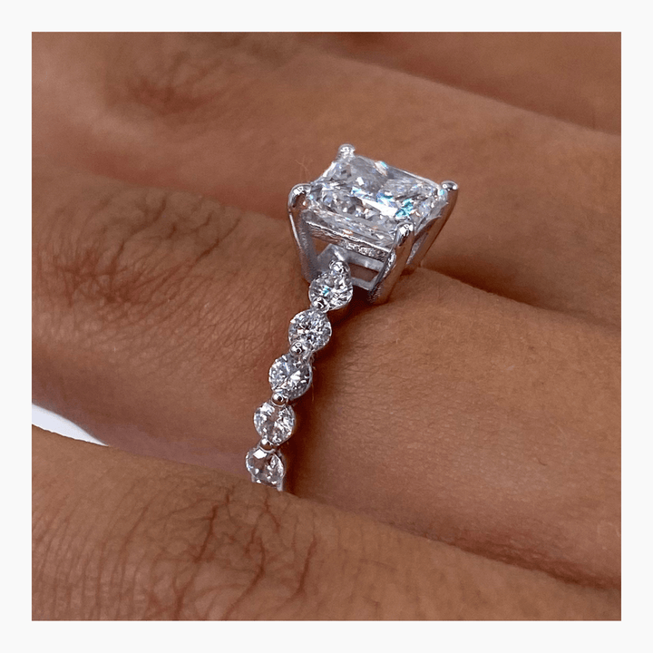 Princess pave engagement ring shown on hand for true-to-life sizing