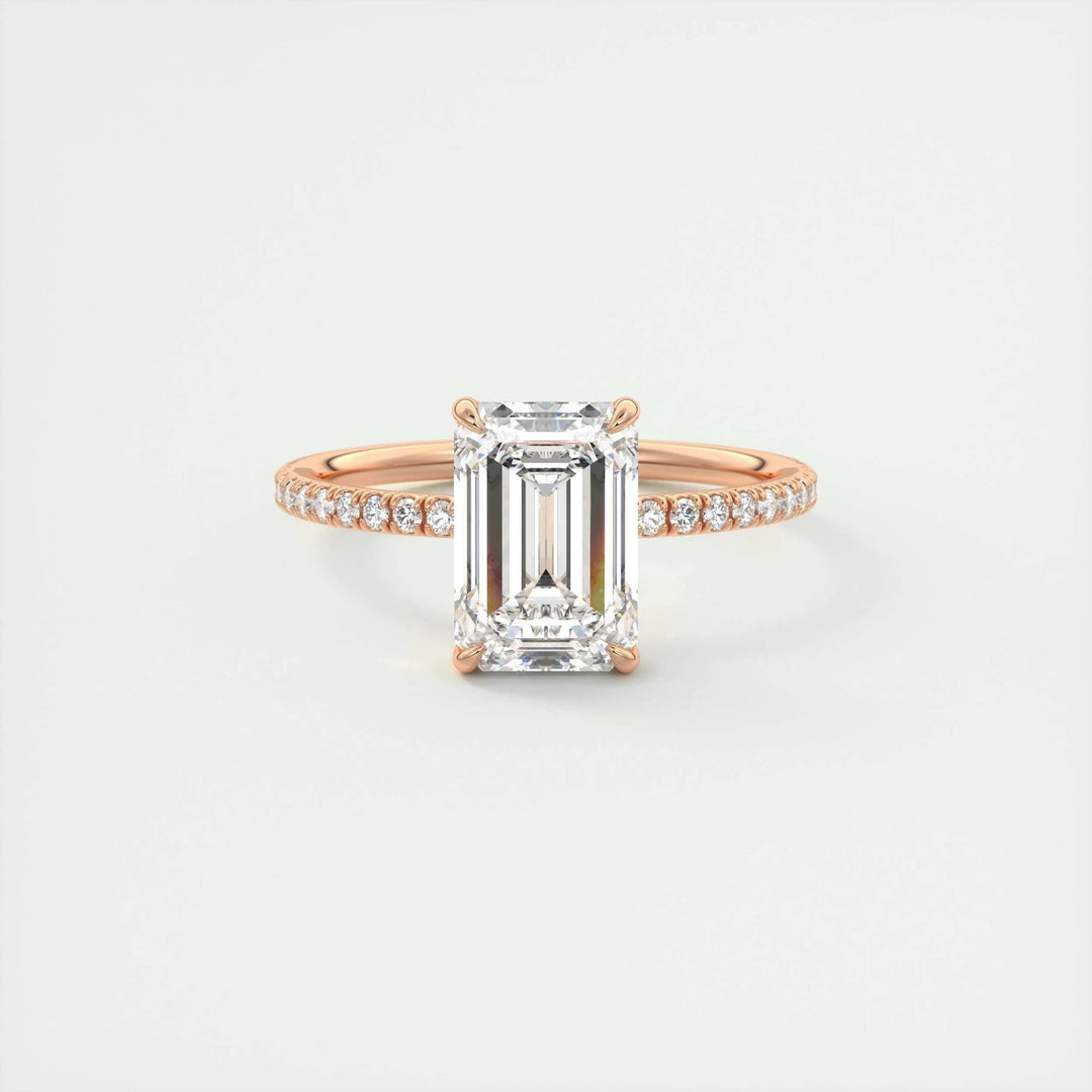 Emerald pave engagement ring close-up showing F-/VS1 diamond clarity