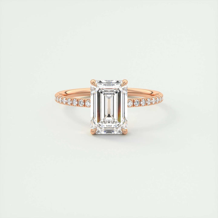 Emerald pave engagement ring close-up showing F-/VS1 diamond clarity