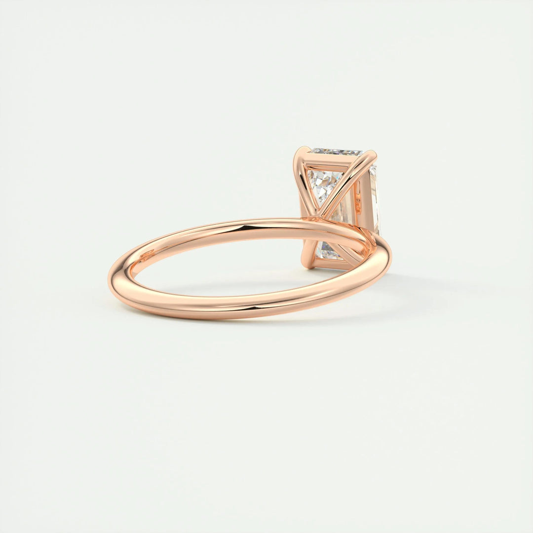 Emerald cut diamond ring worn on hand