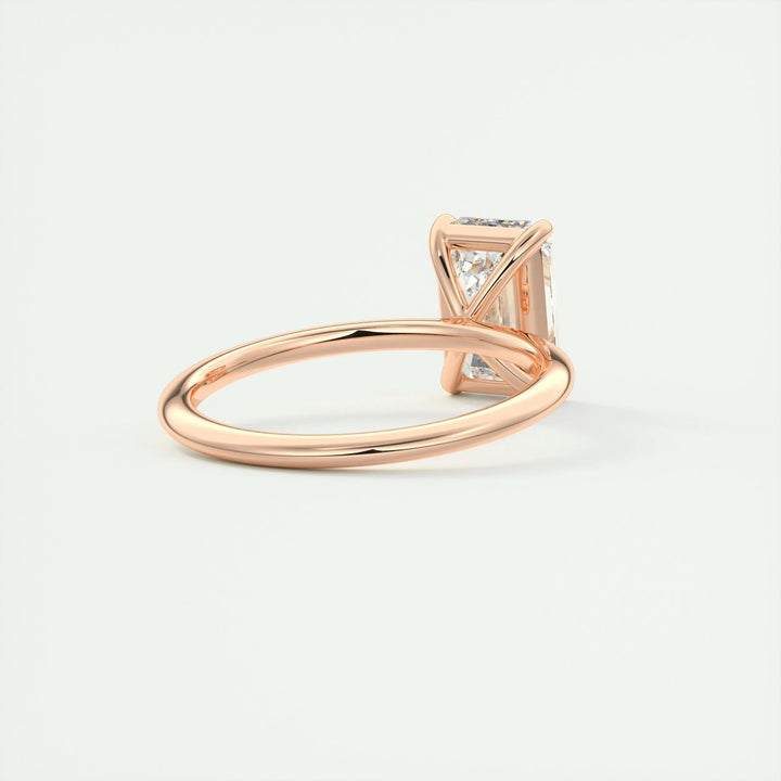 Emerald cut diamond ring worn on hand