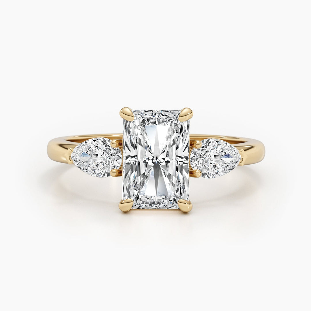 Profile view of radiant cut three stone engagement ring band
