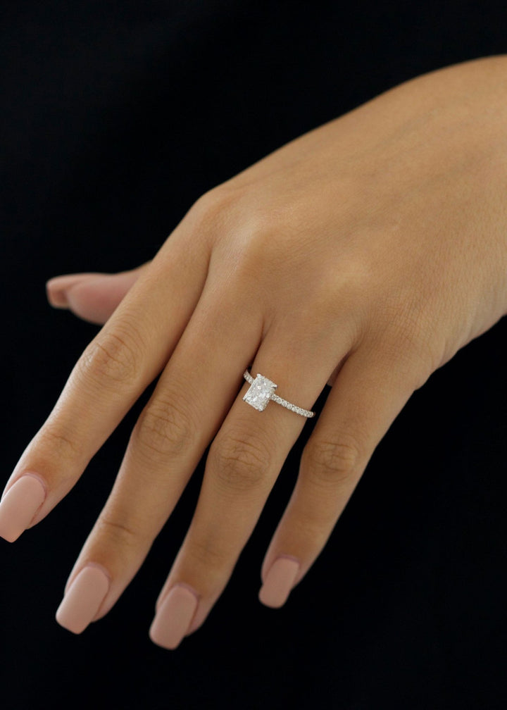 Radiant pave engagement ring close-up highlighting diamond sparkle