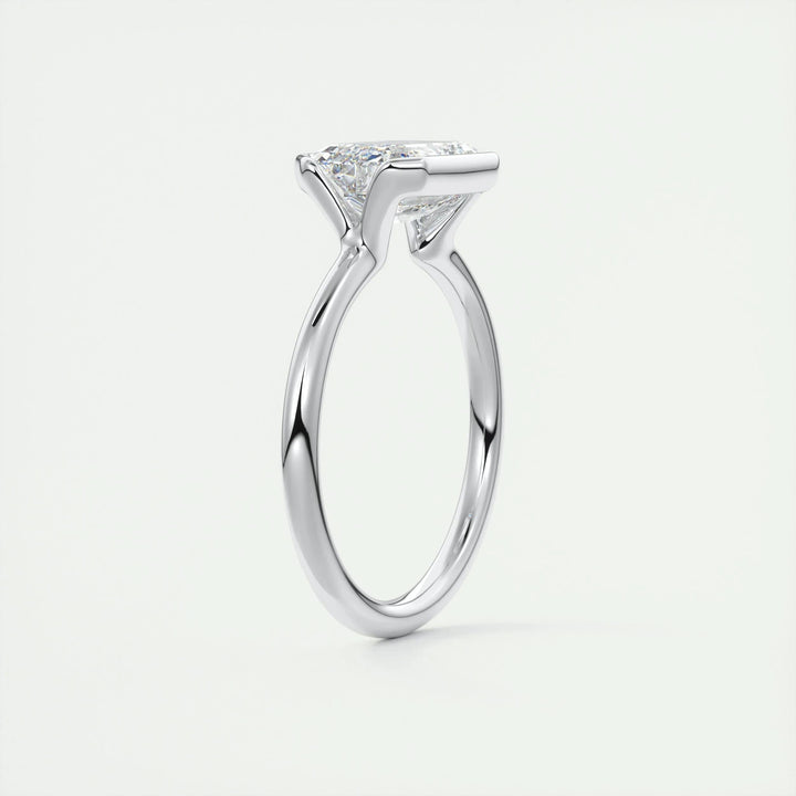 Premium emerald cut solitaire engagement ring crafted in solid gold