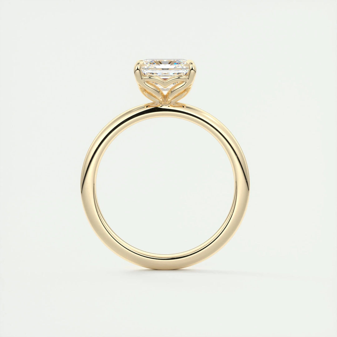 Asscher solitaire engagement ring close-up showing F-/VS1 diamond clarity