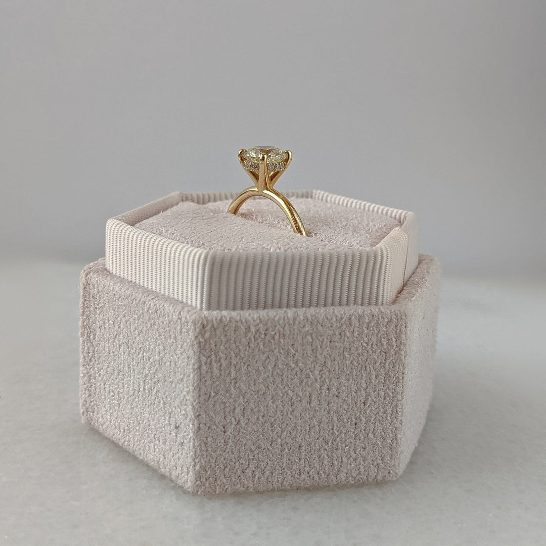 Shop the round cut hidden halo engagement ring collection online