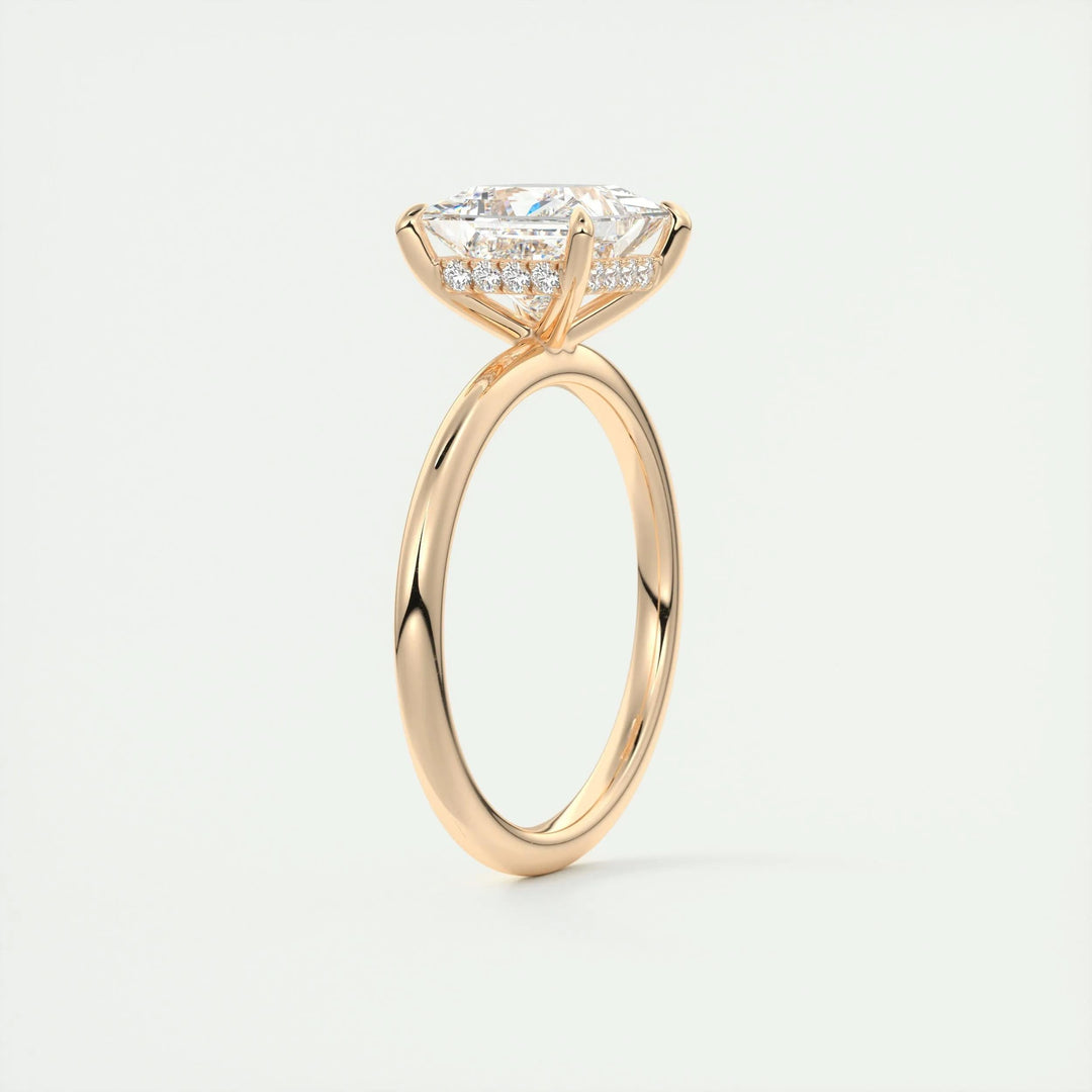 Princess cut engagement ring shown with authenticity certificate