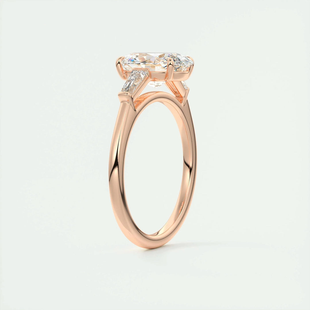 Oval three stone diamond ring presented in signature gift packaging
