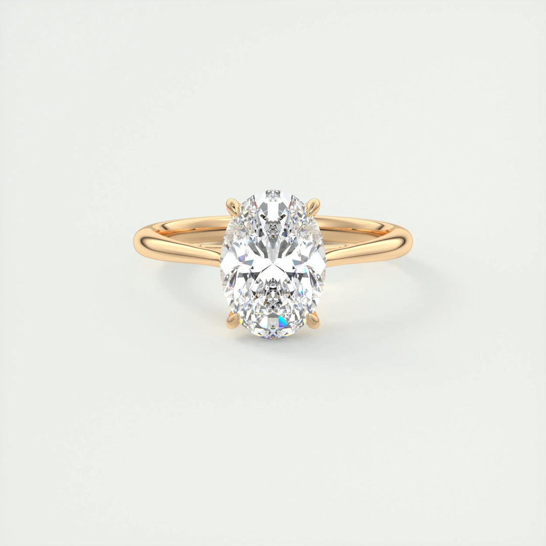 Oval cut solitaire engagement ring shown in real-life wear