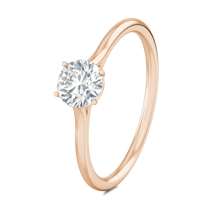 Close-up of round cut center diamond in solitaire engagement ring