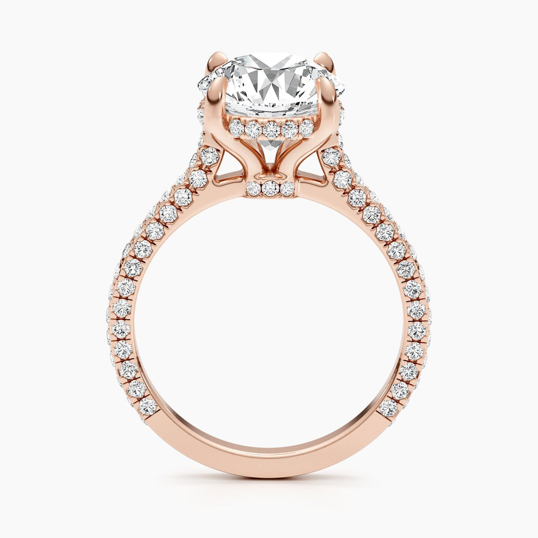 Detailed close-up of round hidden halo diamond engagement ring