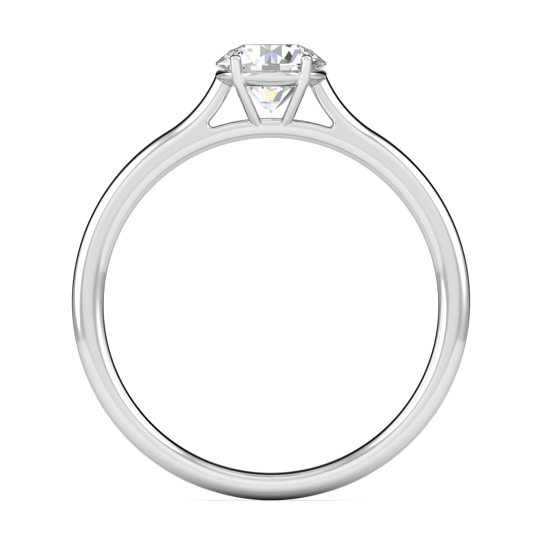 Round solitaire diamond ring displayed on jewelry stand