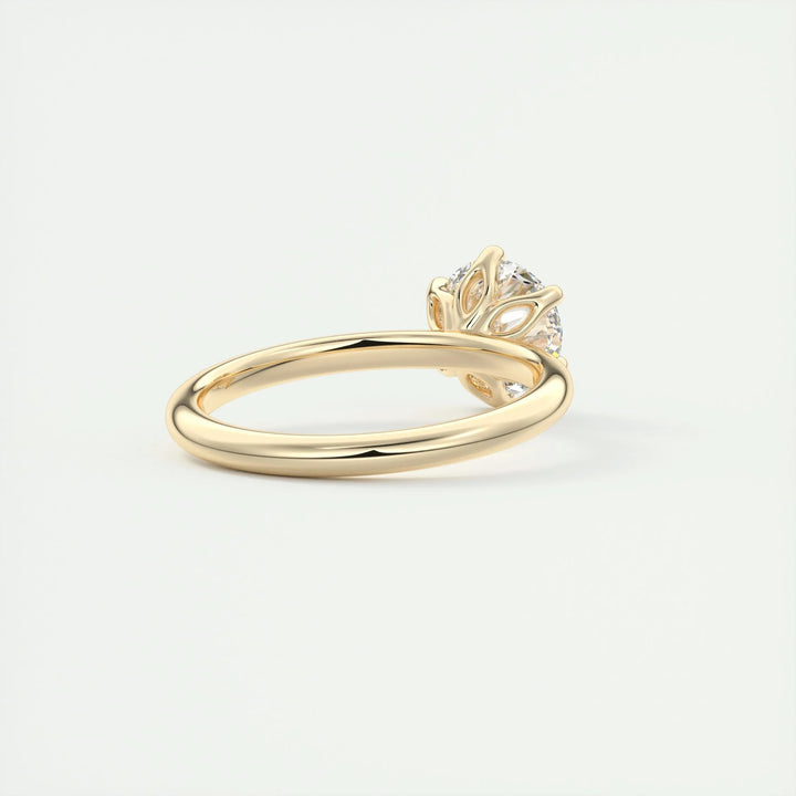 Detailed close-up of round solitaire diamond engagement ring