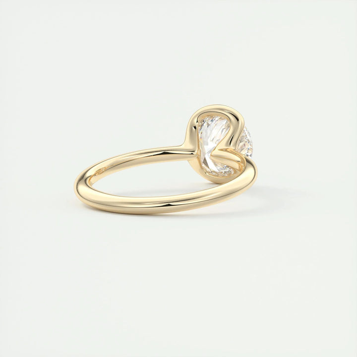 Profile view of round cut solitaire engagement ring band