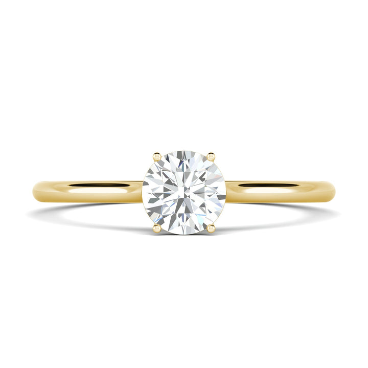 Detailed close-up of round solitaire diamond engagement ring