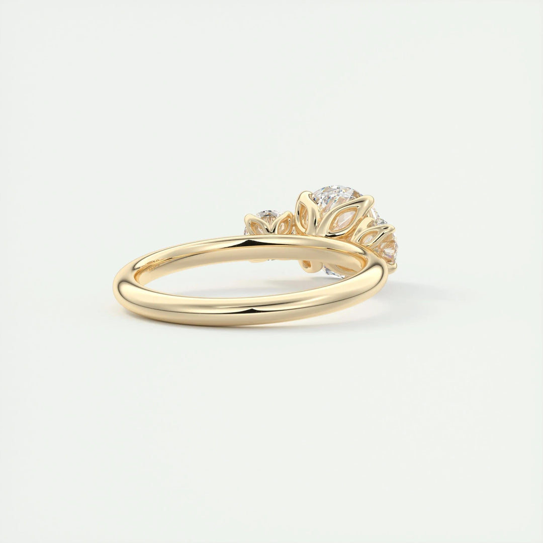 Round three stone engagement ring close-up showing F-/VS1 diamond clarity