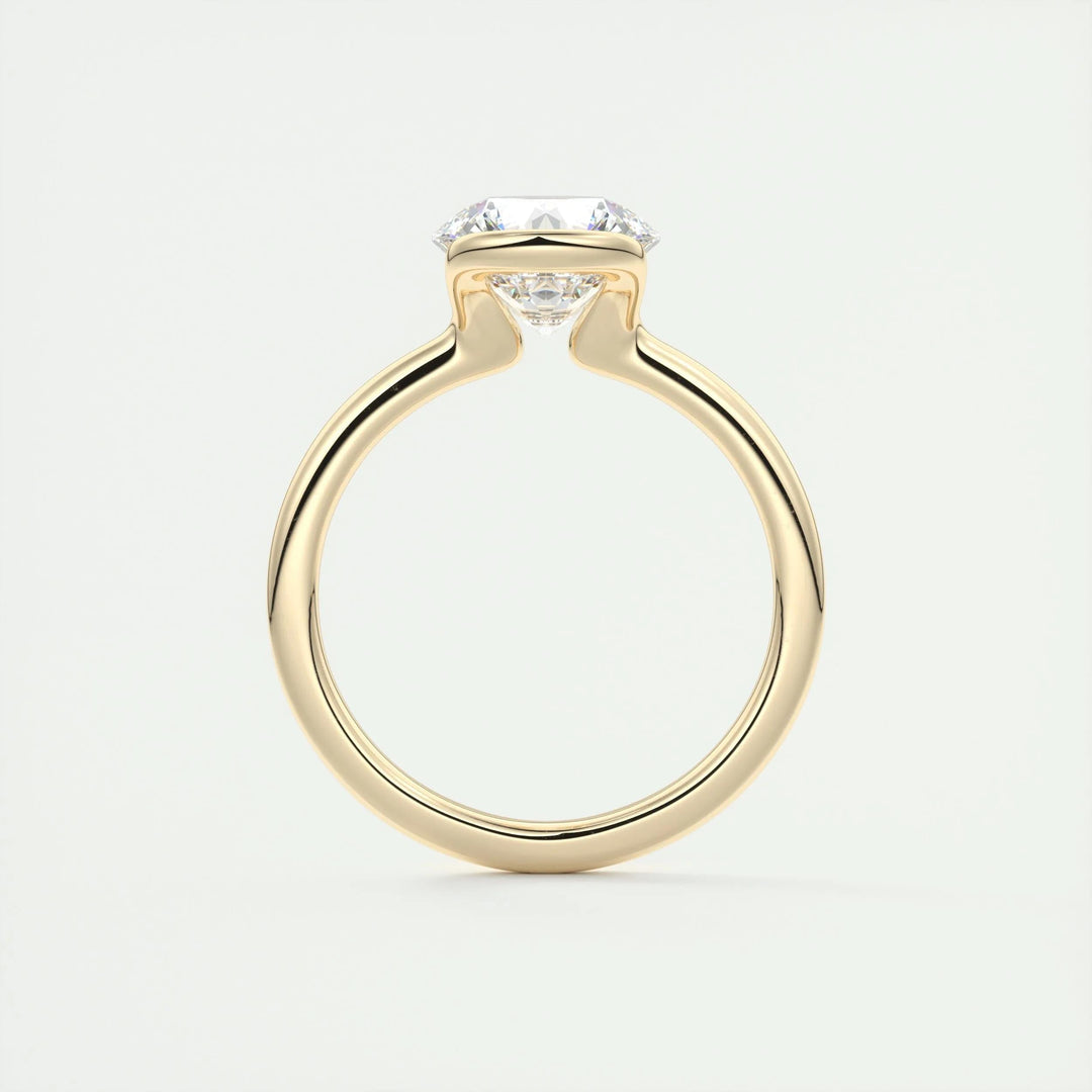 Round solitaire lab grown diamond ring fitted on finger