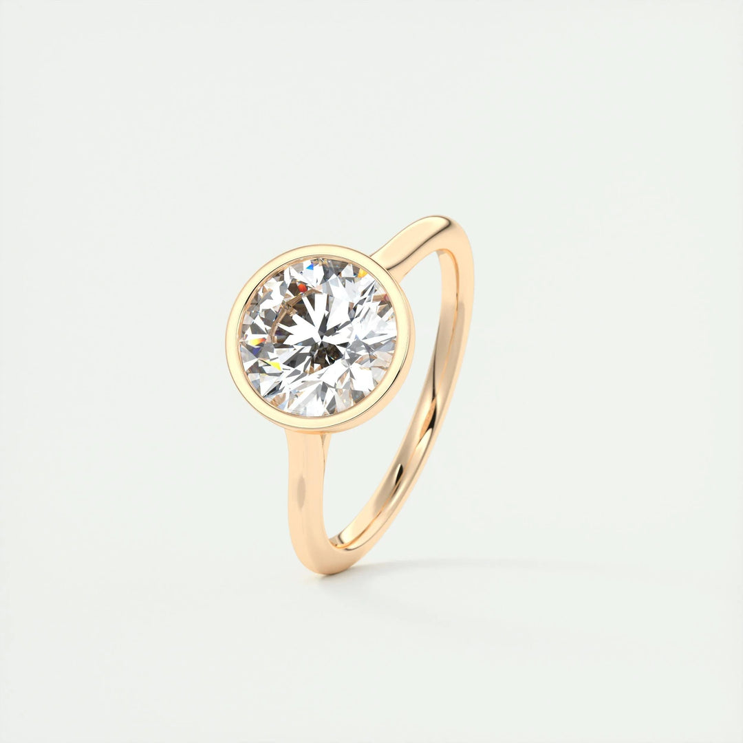 Round bezel engagement ring viewed from the side