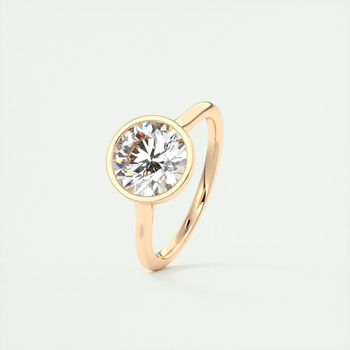 Round bezel engagement ring viewed from the side