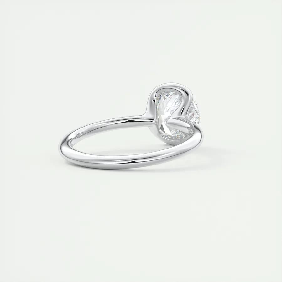 Round solitaire engagement ring close-up highlighting diamond sparkle