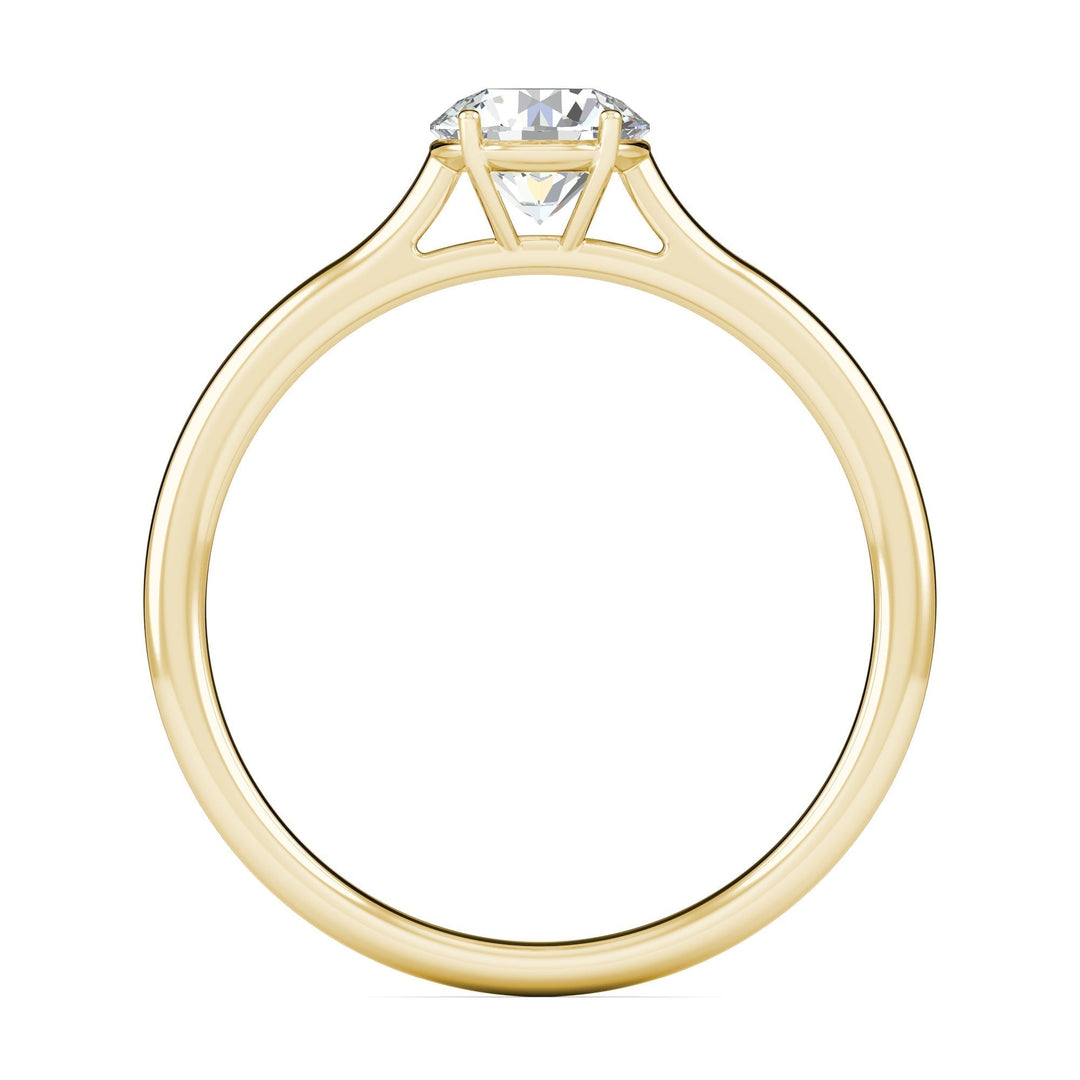 Side angle of round solitaire diamond engagement ring