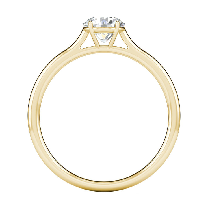 Side angle of round solitaire diamond engagement ring